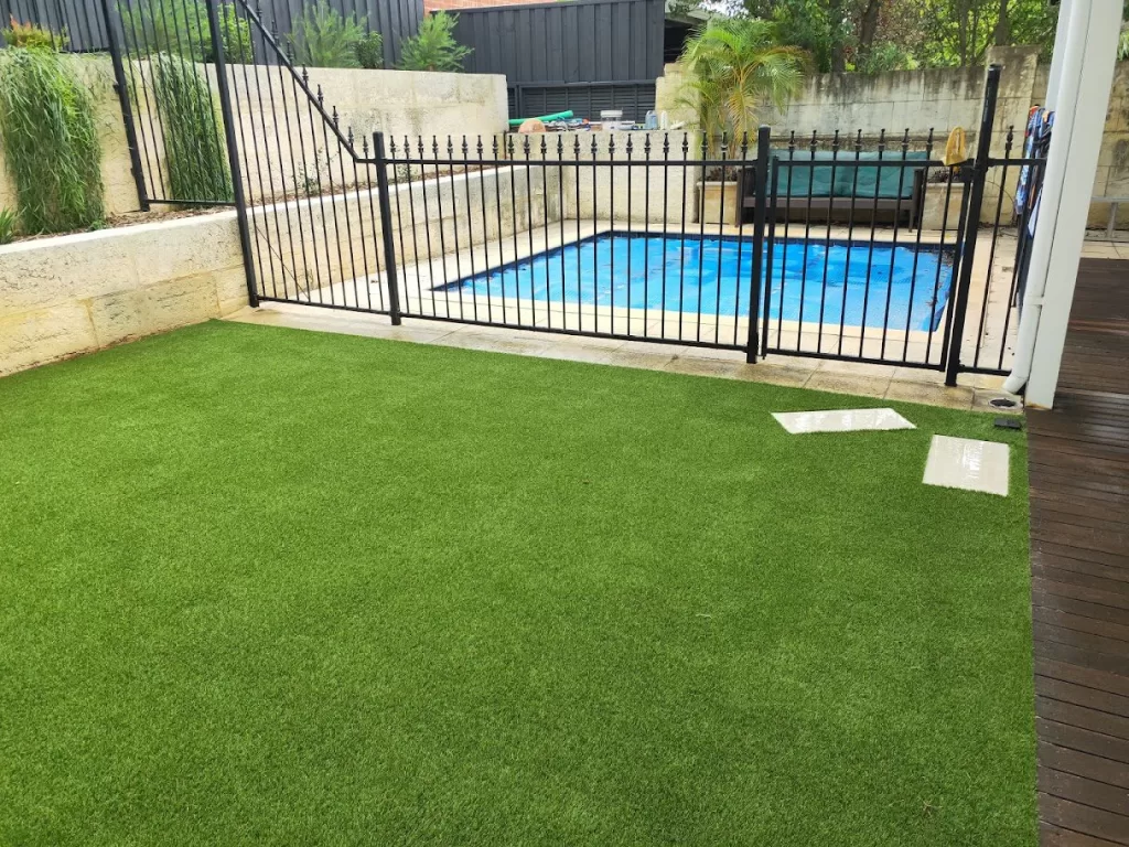 Fake turf by the pool in Erskine WA